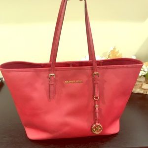 Michael Kors red handbag